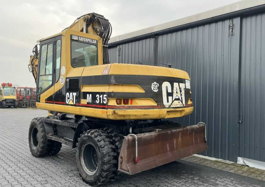 CAT Lift Trucks M315 - Колёсный экскаватор: фото 3 CAT Lift Trucks M315 - Колёсный экскаватор: фото 3