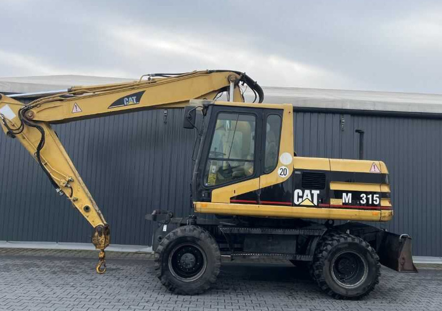 CAT Lift Trucks M315 - Колёсный экскаватор: фото 2 CAT Lift Trucks M315 - Колёсный экскаватор: фото 2