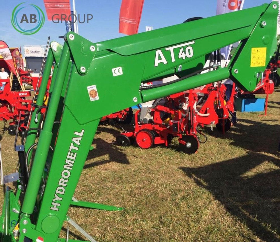 Hydrometal front loader AT-40 - Фронтальный погрузчик для трактора: фото 1 Hydrometal front loader AT-40 - Фронтальный погрузчик для трактора: фото 1