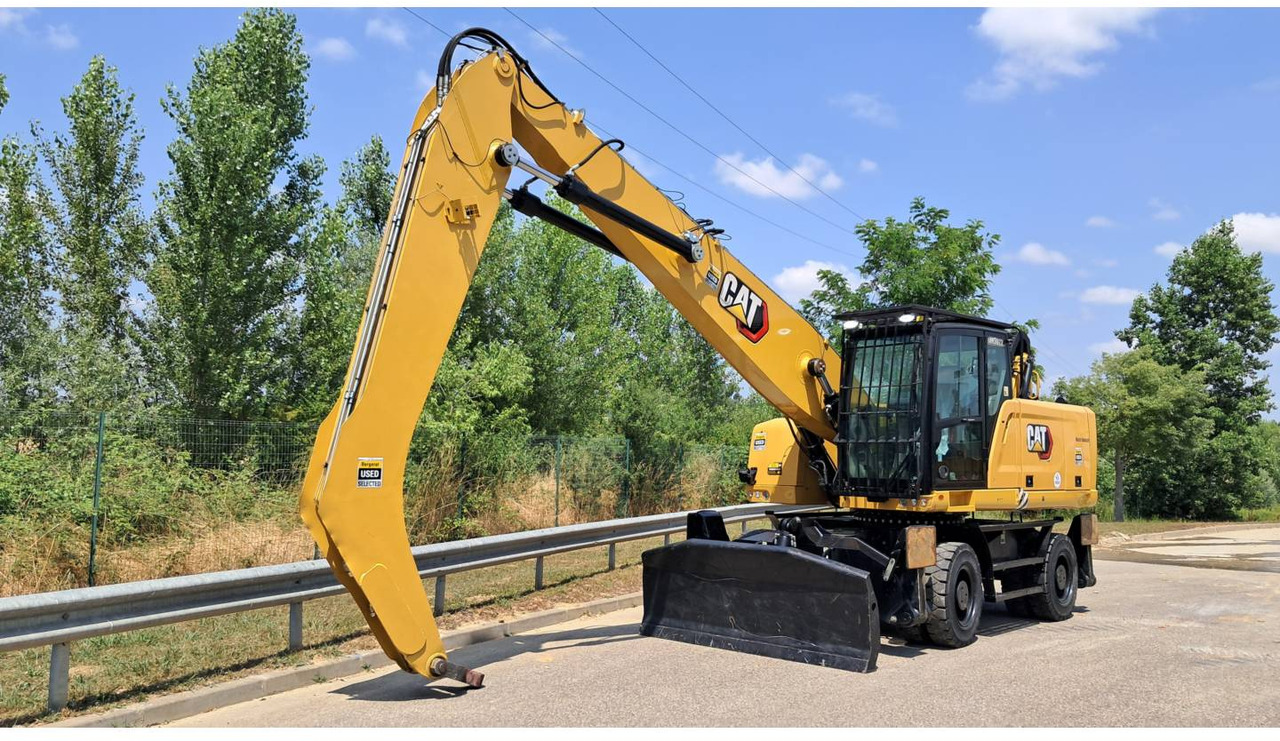 CAT MH3022-1 - Колёсный экскаватор: фото 1 CAT MH3022-1 - Колёсный экскаватор: фото 1