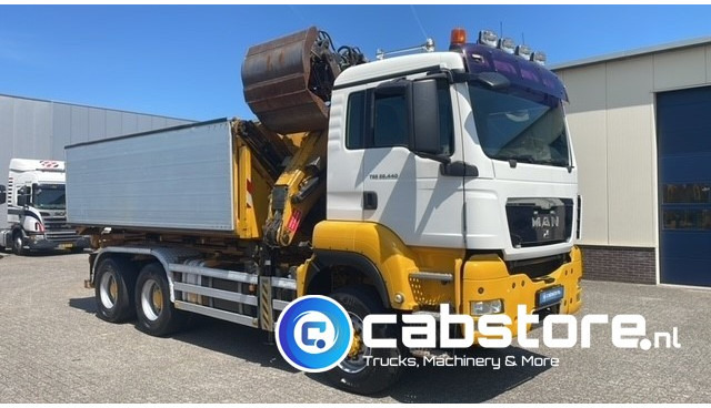 MAN TGS 26.440 6X6 BB EEV MAN TGS 26.440 Euro 5 EEV - 6X6 - Laadkraan - Kipper - Kabelsysteem - Bouwjaar 2010 - Km 657.509 - APK tot 22-11-2025 !! - Самосвал, Автоманипулятор: фото 1 MAN TGS 26.440 6X6 BB EEV MAN TGS 26.440 Euro 5 EEV - 6X6 - Laadkraan - Kipper - Kabelsysteem - Bouwjaar 2010 - Km 657.509 - APK tot 22-11-2025 !! - Самосвал, Автоманипулятор: фото 1