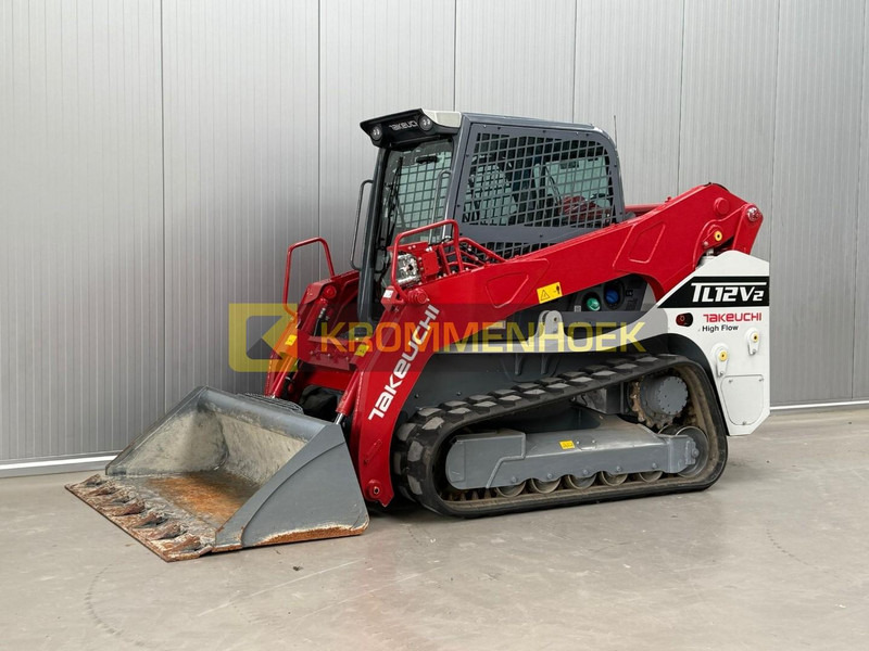 Takeuchi TL 12V-2 - Мини-погрузчик с бортовым поворотом: фото 2 Takeuchi TL 12V-2 - Мини-погрузчик с бортовым поворотом: фото 2