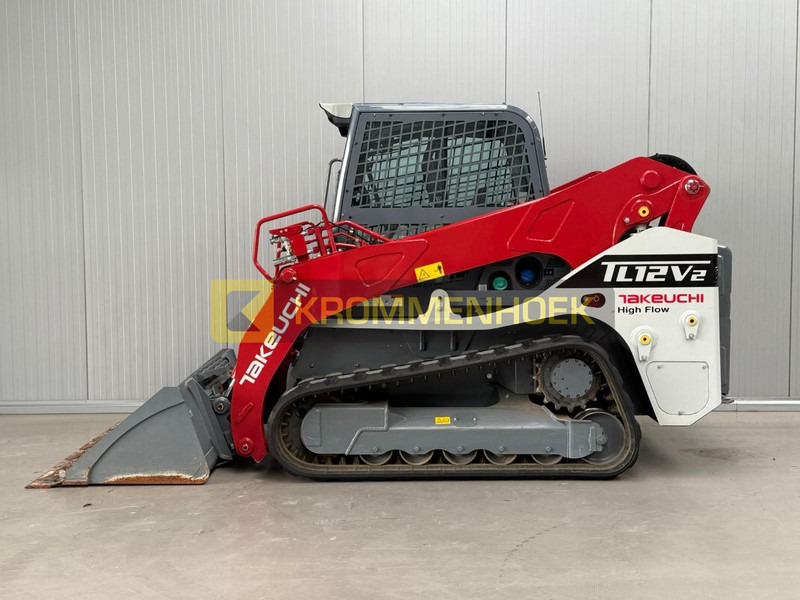 Takeuchi TL 12V-2 - Мини-погрузчик с бортовым поворотом: фото 1 Takeuchi TL 12V-2 - Мини-погрузчик с бортовым поворотом: фото 1