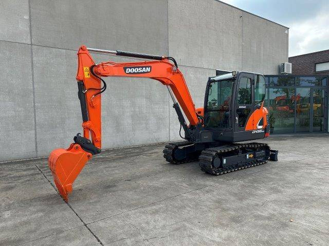 Doosan DX55-9C - Гусеничный экскаватор: фото 1 Doosan DX55-9C - Гусеничный экскаватор: фото 1