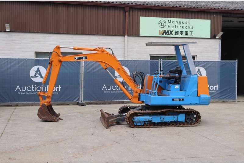 Kubota KH-033 - Мини-экскаватор: фото 1 Kubota KH-033 - Мини-экскаватор: фото 1
