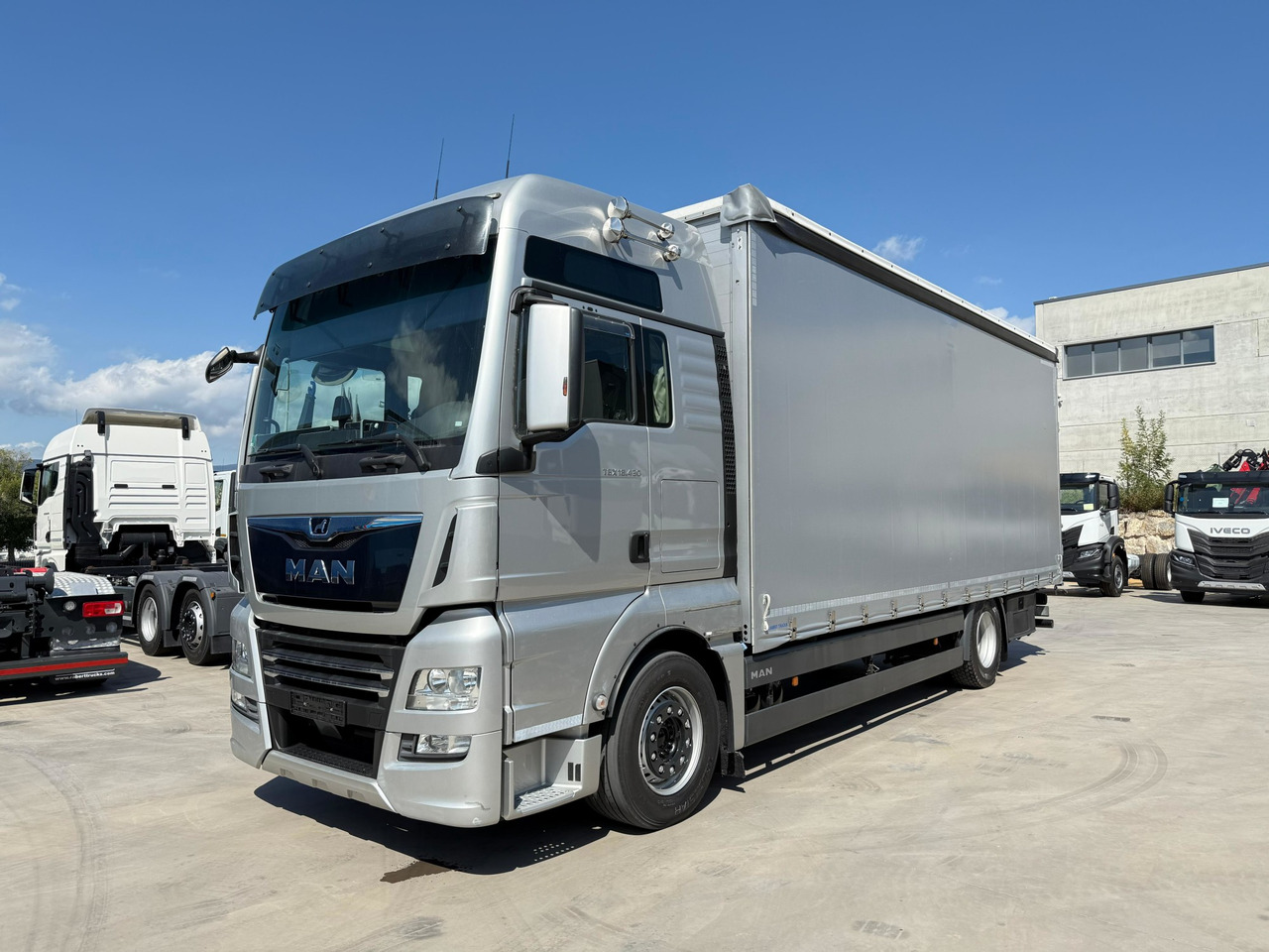 MAN 18.430 LL TGX E6 (Tauliner) - Тентованный грузовик: фото 1 MAN 18.430 LL TGX E6 (Tauliner) - Тентованный грузовик: фото 1