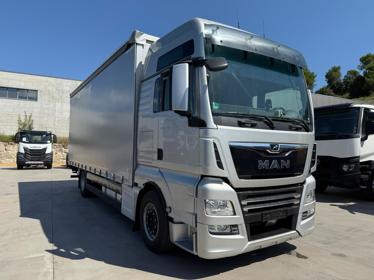 MAN 18.430 LL TGX E6 (Tauliner) - Тентованный грузовик: фото 2 MAN 18.430 LL TGX E6 (Tauliner) - Тентованный грузовик: фото 2