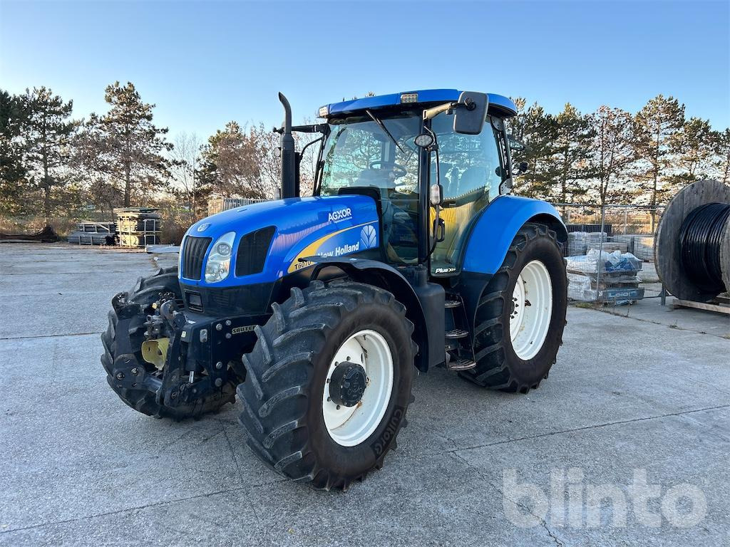 New Holland TS135A (2007) - Трактор: фото 1 New Holland TS135A (2007) - Трактор: фото 1