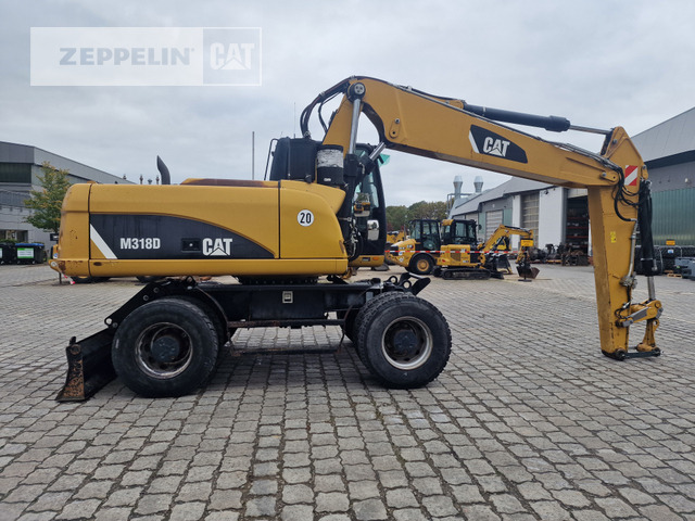 Cat M318D в лизинг Cat M318D: фото 7