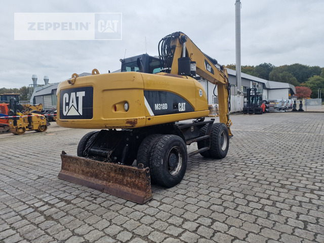 Cat M318D в лизинг Cat M318D: фото 6