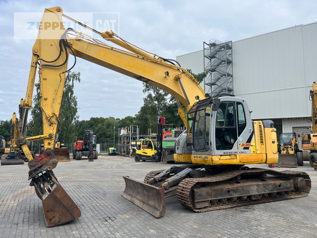New Holland E235 - Гусеничный экскаватор: фото 1 New Holland E235 - Гусеничный экскаватор: фото 1
